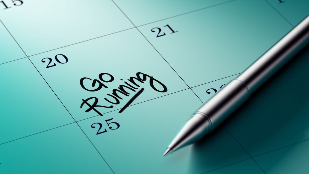 A calendar with the word go running written on it.
